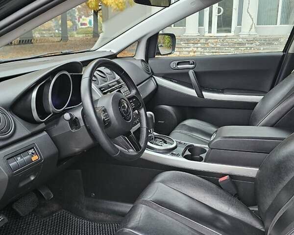 Черный Мазда СХ-7, объемом двигателя 2.26 л и пробегом 205 тыс. км за 5500 $, фото 19 на Automoto.ua