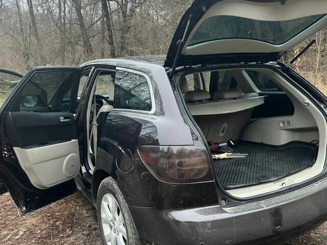 Черный Мазда СХ-7, объемом двигателя 2.3 л и пробегом 153 тыс. км за 7000 $, фото 3 на Automoto.ua