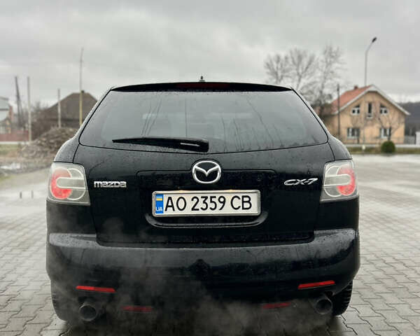Чорний Мазда СХ-7, об'ємом двигуна 2.3 л та пробігом 179 тис. км за 6750 $, фото 4 на Automoto.ua