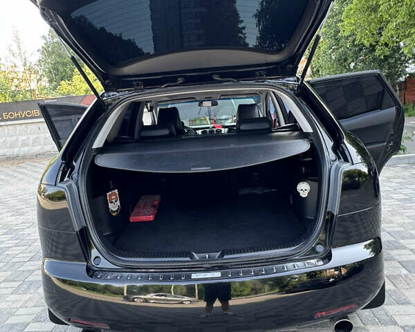 Чорний Мазда СХ-7, об'ємом двигуна 2.3 л та пробігом 137 тис. км за 7950 $, фото 12 на Automoto.ua