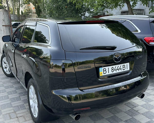 Черный Мазда СХ-7, объемом двигателя 2.3 л и пробегом 137 тыс. км за 8100 $, фото 3 на Automoto.ua