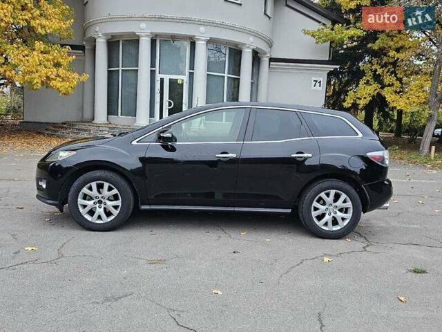 Черный Мазда СХ-7, объемом двигателя 2.26 л и пробегом 205 тыс. км за 5500 $, фото 12 на Automoto.ua