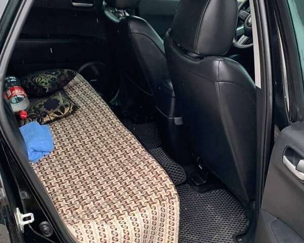 Черный Мазда СХ-7, объемом двигателя 2.3 л и пробегом 145 тыс. км за 7900 $, фото 16 на Automoto.ua