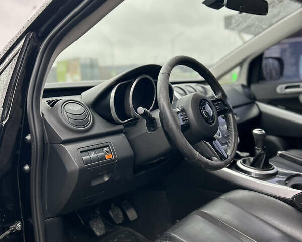 Чорний Мазда СХ-7, об'ємом двигуна 2.3 л та пробігом 179 тис. км за 6750 $, фото 8 на Automoto.ua