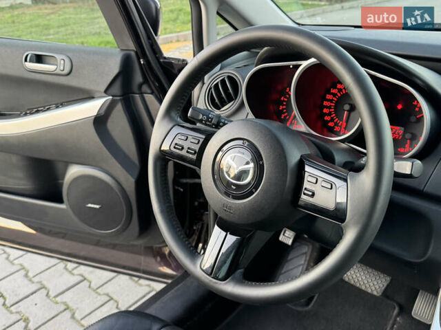 Черный Мазда СХ-7, объемом двигателя 2.3 л и пробегом 124 тыс. км за 7800 $, фото 61 на Automoto.ua