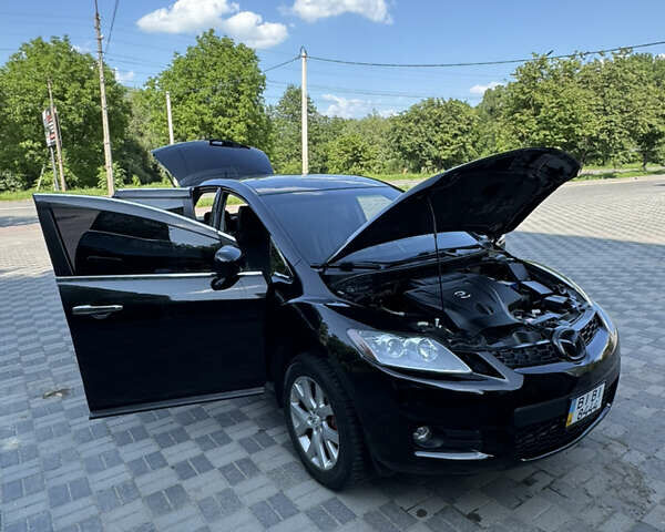 Черный Мазда СХ-7, объемом двигателя 2.3 л и пробегом 137 тыс. км за 8100 $, фото 19 на Automoto.ua
