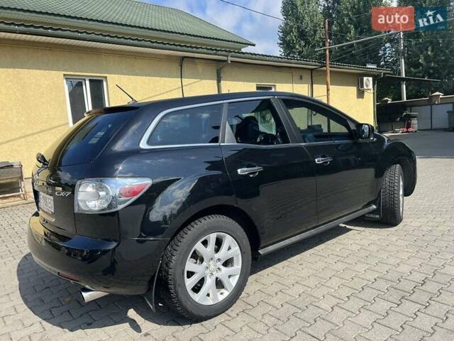 Черный Мазда СХ-7, объемом двигателя 2.25 л и пробегом 60 тыс. км за 8200 $, фото 1 на Automoto.ua