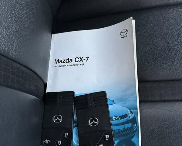 Черный Мазда СХ-7, объемом двигателя 2.3 л и пробегом 124 тыс. км за 7800 $, фото 39 на Automoto.ua