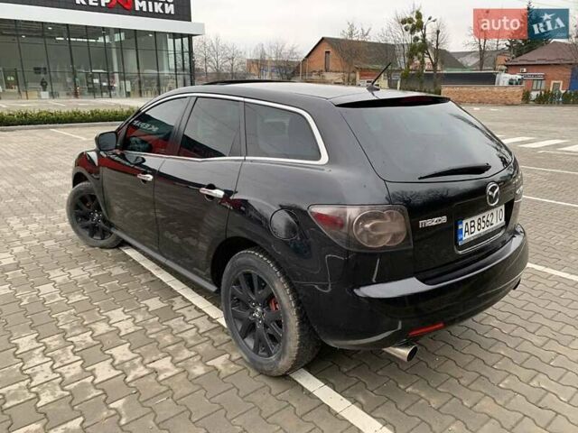 Черный Мазда СХ-7, объемом двигателя 2.3 л и пробегом 145 тыс. км за 7900 $, фото 11 на Automoto.ua