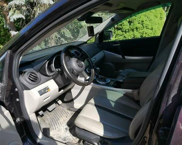 Черный Мазда СХ-7, объемом двигателя 2.26 л и пробегом 230 тыс. км за 6100 $, фото 2 на Automoto.ua