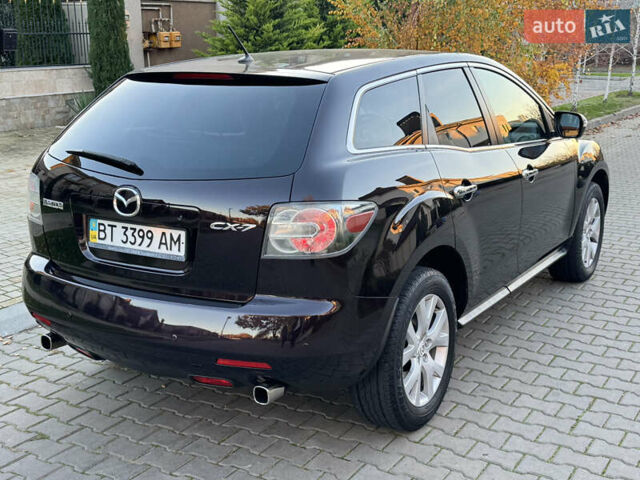 Черный Мазда СХ-7, объемом двигателя 2.3 л и пробегом 124 тыс. км за 7800 $, фото 16 на Automoto.ua