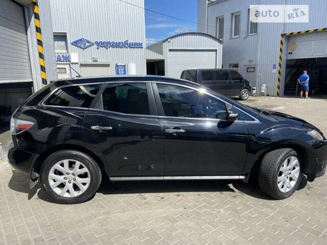 Черный Мазда СХ-7, объемом двигателя 2.3 л и пробегом 313 тыс. км за 5000 $, фото 2 на Automoto.ua