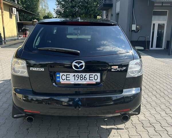 Черный Мазда СХ-7, объемом двигателя 2.25 л и пробегом 60 тыс. км за 8200 $, фото 4 на Automoto.ua