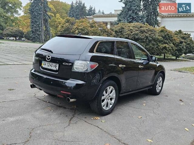 Черный Мазда СХ-7, объемом двигателя 2.26 л и пробегом 205 тыс. км за 5500 $, фото 4 на Automoto.ua