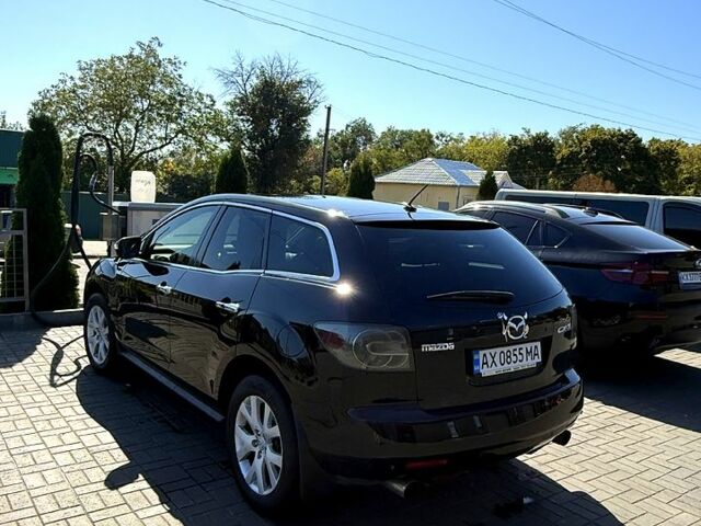 Черный Мазда СХ-7, объемом двигателя 2.3 л и пробегом 288 тыс. км за 8500 $, фото 1 на Automoto.ua