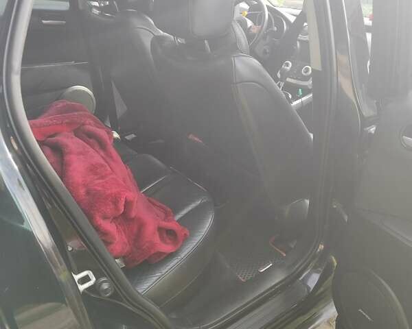 Чорний Мазда СХ-7, об'ємом двигуна 2.3 л та пробігом 177 тис. км за 6600 $, фото 5 на Automoto.ua