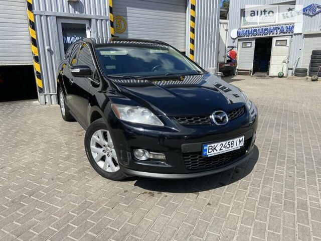 Черный Мазда СХ-7, объемом двигателя 2.3 л и пробегом 313 тыс. км за 5000 $, фото 1 на Automoto.ua