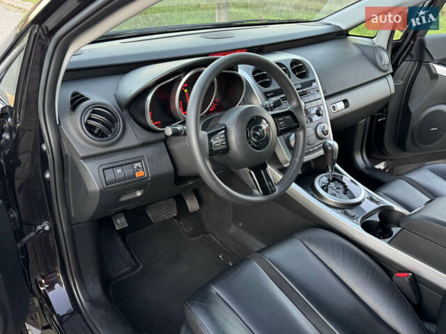 Черный Мазда СХ-7, объемом двигателя 2.3 л и пробегом 124 тыс. км за 7800 $, фото 40 на Automoto.ua