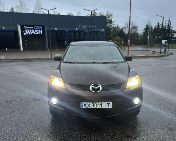 Черный Мазда СХ-7, объемом двигателя 2.26 л и пробегом 133 тыс. км за 7500 $, фото 1 на Automoto.ua