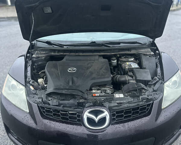 Черный Мазда СХ-7, объемом двигателя 2.26 л и пробегом 133 тыс. км за 7500 $, фото 7 на Automoto.ua