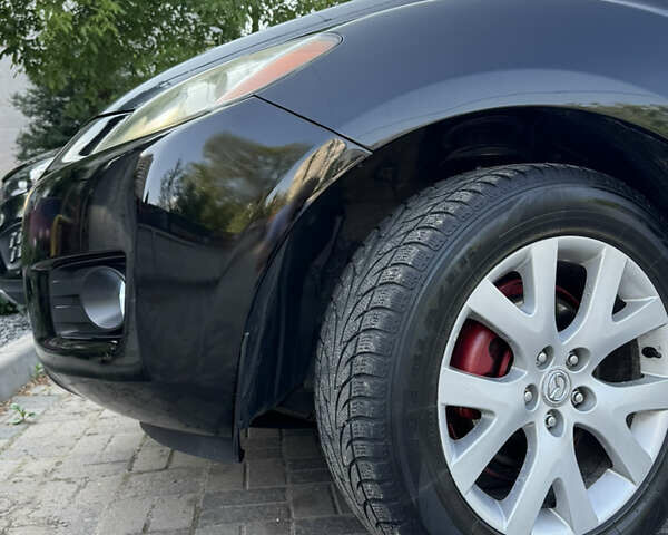 Черный Мазда СХ-7, объемом двигателя 2.3 л и пробегом 137 тыс. км за 8100 $, фото 5 на Automoto.ua