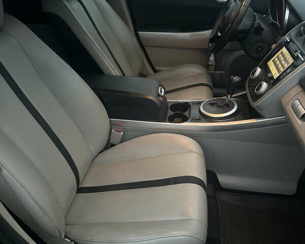 Черный Мазда СХ-7, объемом двигателя 2.26 л и пробегом 133 тыс. км за 7500 $, фото 12 на Automoto.ua