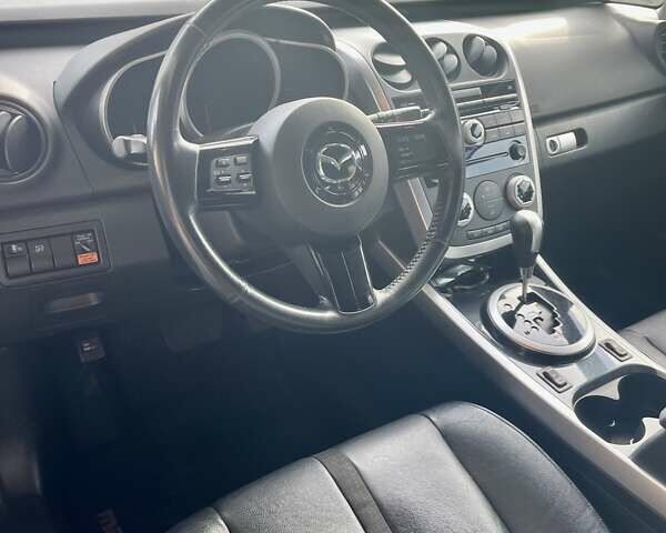 Черный Мазда СХ-7, объемом двигателя 2.3 л и пробегом 74 тыс. км за 7850 $, фото 4 на Automoto.ua