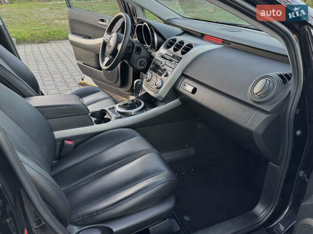 Черный Мазда СХ-7, объемом двигателя 2.3 л и пробегом 124 тыс. км за 7800 $, фото 56 на Automoto.ua