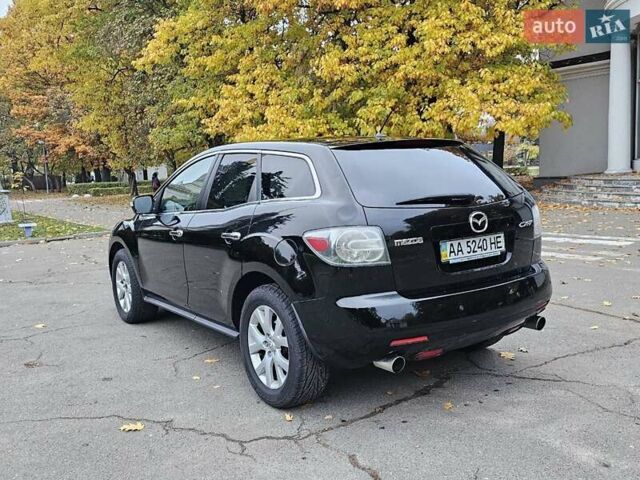 Черный Мазда СХ-7, объемом двигателя 2.26 л и пробегом 205 тыс. км за 5500 $, фото 8 на Automoto.ua