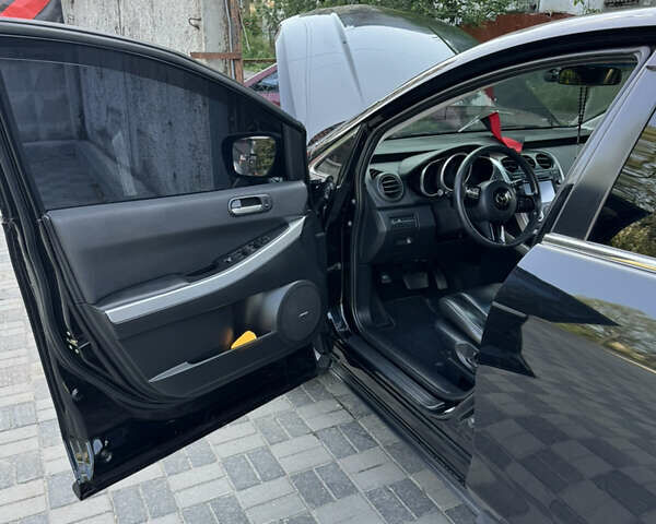 Черный Мазда СХ-7, объемом двигателя 2.3 л и пробегом 137 тыс. км за 8100 $, фото 10 на Automoto.ua