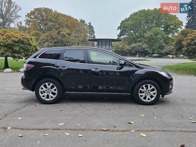 Черный Мазда СХ-7, объемом двигателя 2.26 л и пробегом 205 тыс. км за 5500 $, фото 10 на Automoto.ua