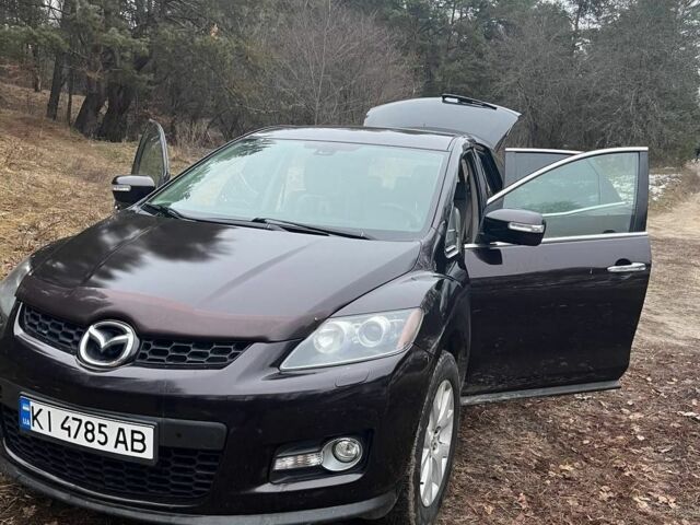 Черный Мазда СХ-7, объемом двигателя 2.3 л и пробегом 153 тыс. км за 7000 $, фото 1 на Automoto.ua