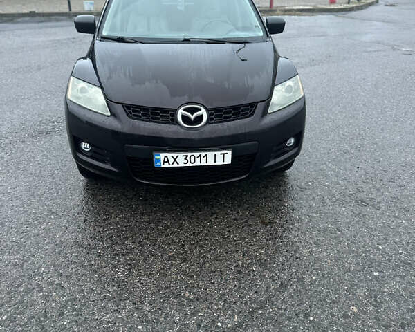 Черный Мазда СХ-7, объемом двигателя 2.26 л и пробегом 133 тыс. км за 7500 $, фото 2 на Automoto.ua