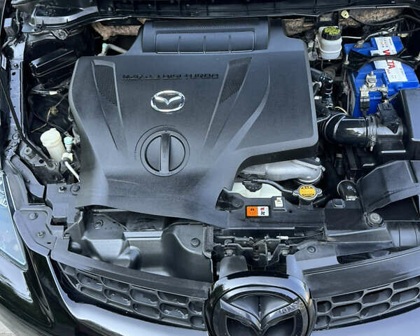Черный Мазда СХ-7, объемом двигателя 2.3 л и пробегом 137 тыс. км за 8100 $, фото 23 на Automoto.ua