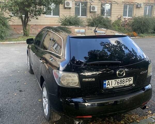 Черный Мазда СХ-7, объемом двигателя 2.3 л и пробегом 117 тыс. км за 6400 $, фото 3 на Automoto.ua