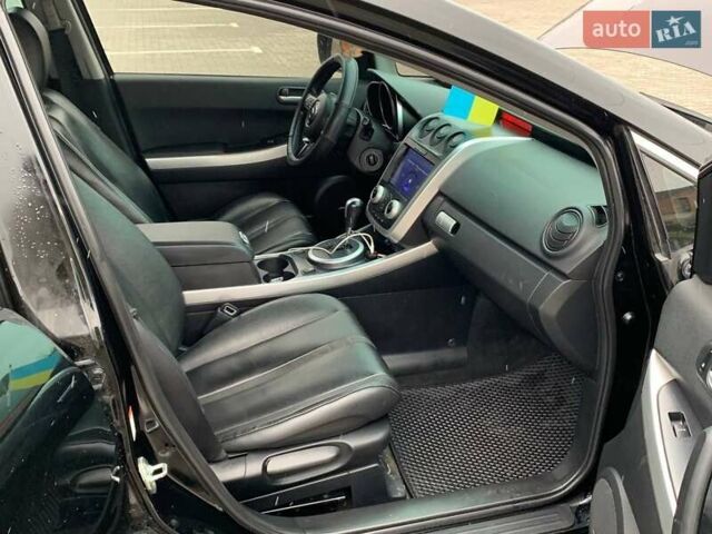 Черный Мазда СХ-7, объемом двигателя 2.3 л и пробегом 145 тыс. км за 7900 $, фото 15 на Automoto.ua