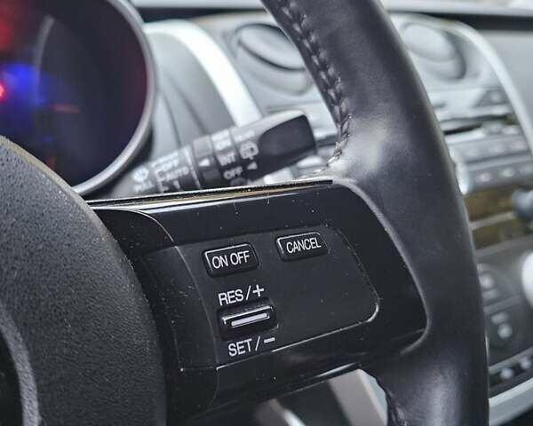 Черный Мазда СХ-7, объемом двигателя 2.26 л и пробегом 205 тыс. км за 5500 $, фото 14 на Automoto.ua