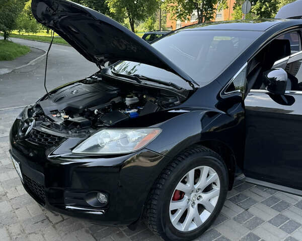 Черный Мазда СХ-7, объемом двигателя 2.3 л и пробегом 137 тыс. км за 8100 $, фото 9 на Automoto.ua