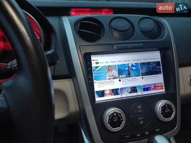 Черный Мазда СХ-7, объемом двигателя 2.26 л и пробегом 179 тыс. км за 7500 $, фото 14 на Automoto.ua
