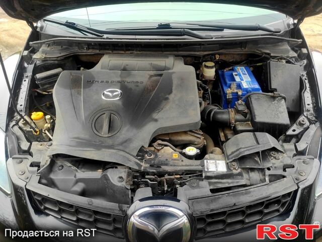 Черный Мазда СХ-7, объемом двигателя 2.3 л и пробегом 182 тыс. км за 6200 $, фото 4 на Automoto.ua