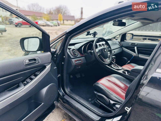 Черный Мазда СХ-7, объемом двигателя 2.49 л и пробегом 169 тыс. км за 5700 $, фото 5 на Automoto.ua