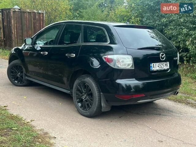 Черный Мазда СХ-7, объемом двигателя 2.49 л и пробегом 260 тыс. км за 9000 $, фото 3 на Automoto.ua