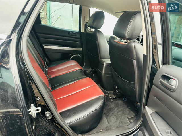 Черный Мазда СХ-7, объемом двигателя 2.49 л и пробегом 169 тыс. км за 5700 $, фото 2 на Automoto.ua