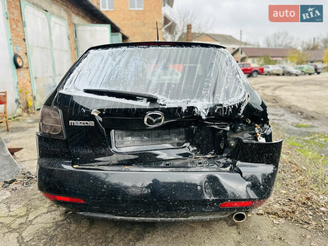 Черный Мазда СХ-7, объемом двигателя 2.49 л и пробегом 169 тыс. км за 5700 $, фото 7 на Automoto.ua