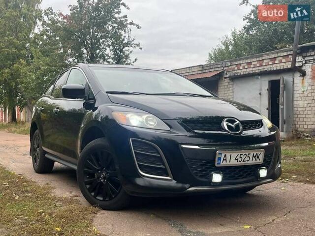 Черный Мазда СХ-7, объемом двигателя 2.49 л и пробегом 260 тыс. км за 9000 $, фото 1 на Automoto.ua