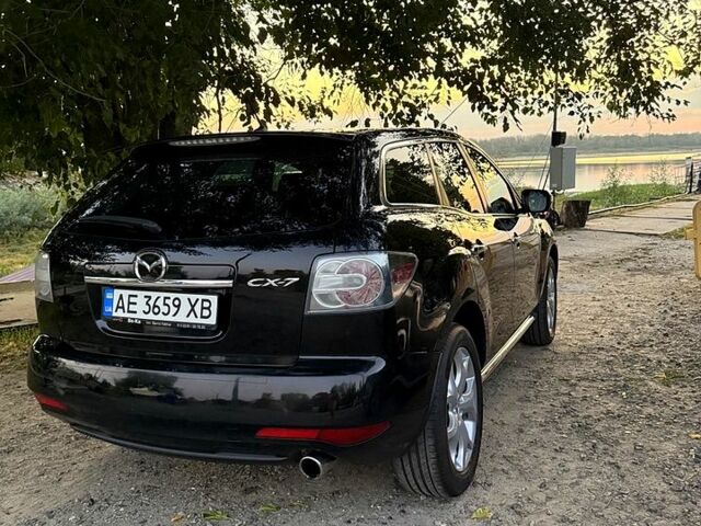 Черный Мазда СХ-7, объемом двигателя 2.2 л и пробегом 143 тыс. км за 9500 $, фото 1 на Automoto.ua