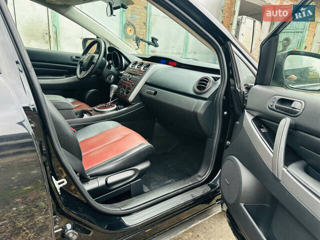 Черный Мазда СХ-7, объемом двигателя 2.49 л и пробегом 169 тыс. км за 5700 $, фото 3 на Automoto.ua