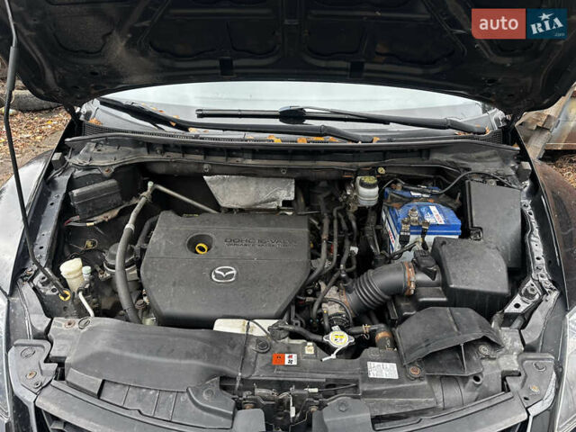 Черный Мазда СХ-7, объемом двигателя 2.49 л и пробегом 169 тыс. км за 5700 $, фото 1 на Automoto.ua