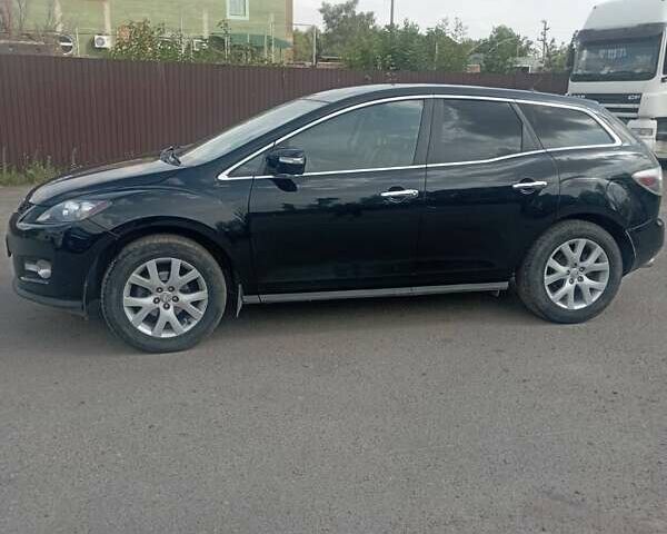 Черный Мазда СХ-7, объемом двигателя 2.26 л и пробегом 226 тыс. км за 6200 $, фото 3 на Automoto.ua