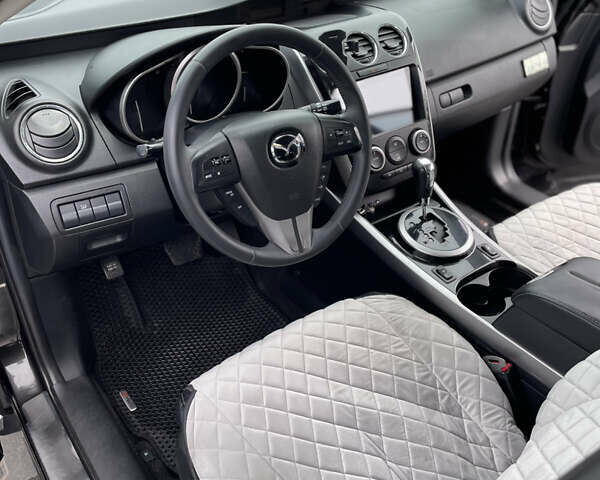 Черный Мазда СХ-7, объемом двигателя 2.26 л и пробегом 185 тыс. км за 9500 $, фото 13 на Automoto.ua